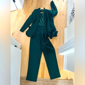 Dark green blazer and high waisted fashion pants